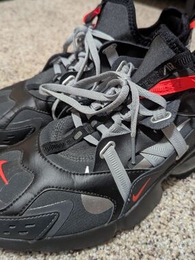 Nike Black and Gray Sneakers with Red Accents